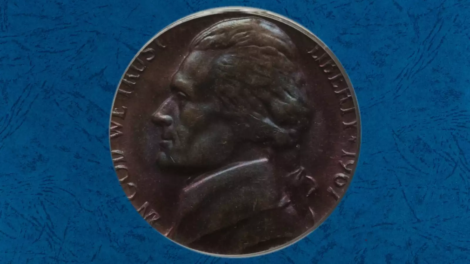 1967 nickel struck on Lincoln cent planchet showing copper-colored disc with nickel design