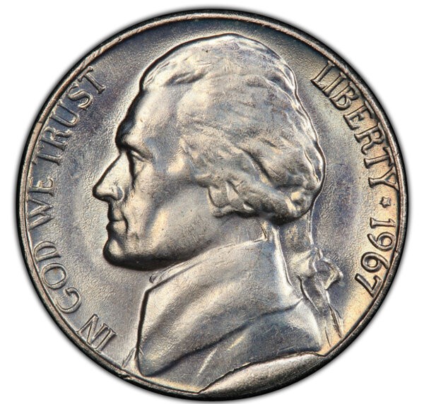 1967 nickel die cud error showing raised blob of metal at coin rim where die fragment was missing